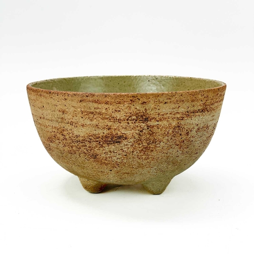 568 - Waistel Cooper (1921-2003). A studio pottery bowl, with glazed interior and raised on four peg feet,... 