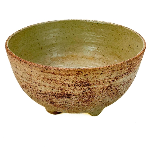 568 - Waistel Cooper (1921-2003). A studio pottery bowl, with glazed interior and raised on four peg feet,... 