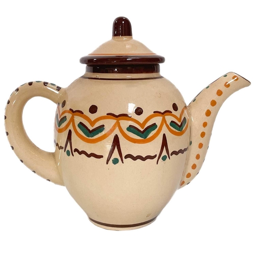 569 - A Quimper pottery tea set. Comprising of a teapot, A two handled lidded sugar bowl, a milk jug, twel... 