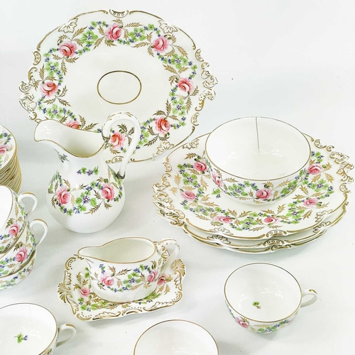 574 - A Derby Stevenson & Hancock porcelain tea set. Circa 1900, hand painted and gilt with roses and spee... 