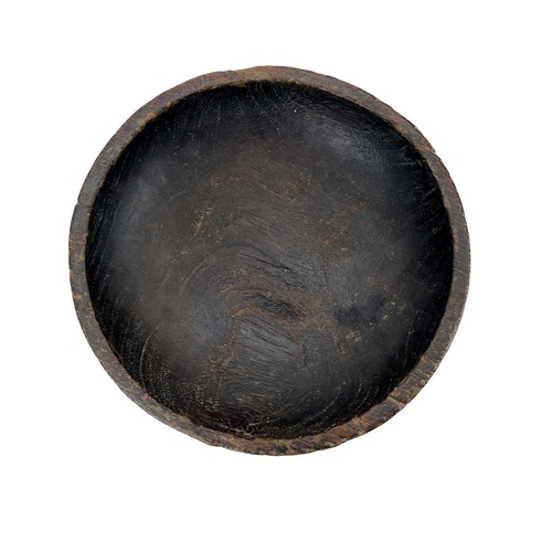 59 - An African tribal stem footed bowl. With a plain dished top on a hollow outward tapering stem, heigh... 