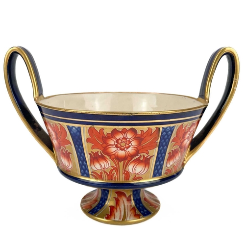 591 - A Macintyre Aurelian pattern twin handled bowl. With underglaze blue, iron red and gilt floral paint... 