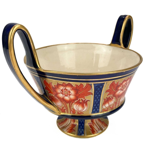 591 - A Macintyre Aurelian pattern twin handled bowl. With underglaze blue, iron red and gilt floral paint... 