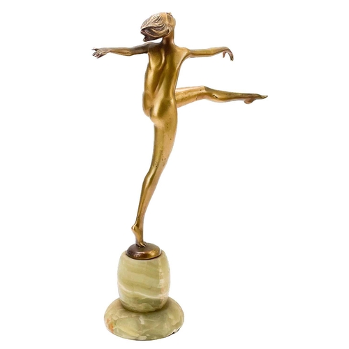 6 - An Art Deco gilt bronze figure of a dancer. On an onyx base, signed Adolf, height 35.5cm Scratches a... 