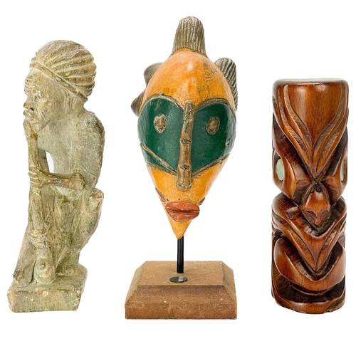 60 - Two Innuit carved soapstone animal groups. Together with a Mauri wood carving, an African soapstone ... 