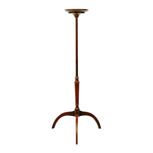 611 - A Regency mahogany pole screen base. With an inlaid tripod base and fluted column and a later torche... 