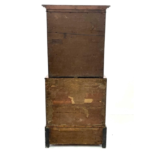 613 - A 19th century walnut and mahogany bookcase. With embroidered panels enclosing various shelves, the ... 