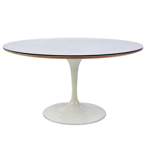 620 - Attributed to Eero Saarinen (American, 1889-1966) for Knoll International. A Tulip table and six swi... 