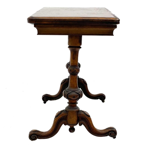 624 - A Victorian fold top burr walnut card table. With baized interior and raised on turned legs and a st... 