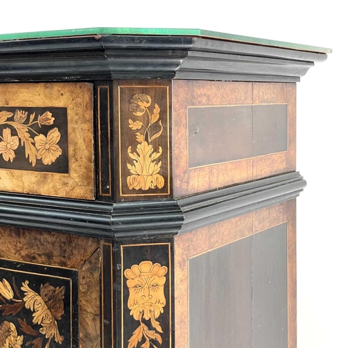 627 - An Italian walnut, ebonised and marquetry side cabinet. 19th century, with a later mirrored top abov... 