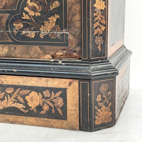 627 - An Italian walnut, ebonised and marquetry side cabinet. 19th century, with a later mirrored top abov... 