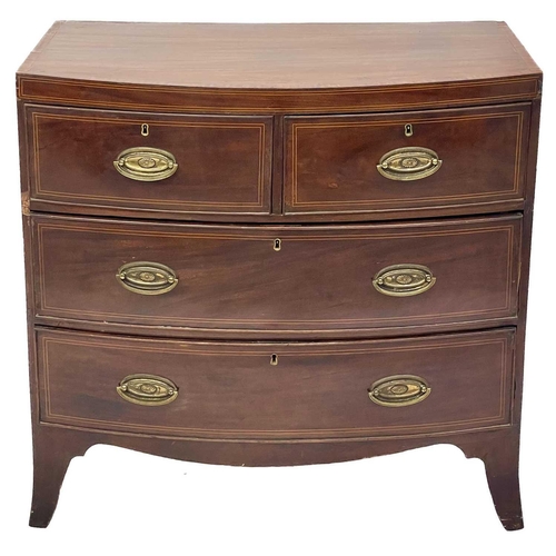 644 - A 19th century bow fronted chest of drawers. With two short and two long drawers, boxwood inlaid str... 