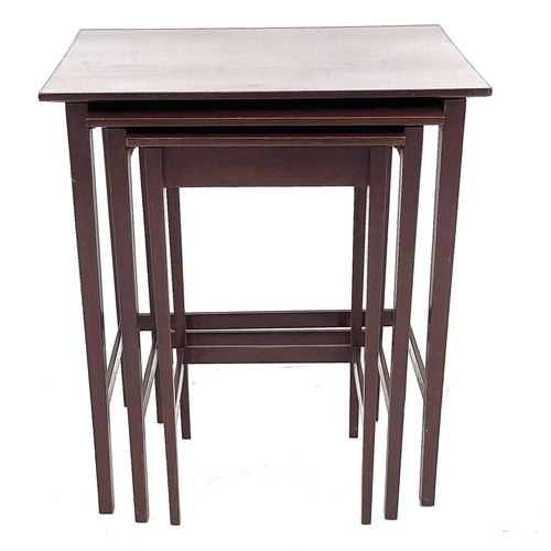 665 - A mahogany nest of three tables. On tapering square supports, height 59cm width 51cm depth 35.5cm.