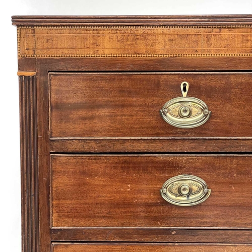 668 - An early 19th century mahogany chest of drawers. With crossbanded inlaid boxwood marquetry strung fr... 