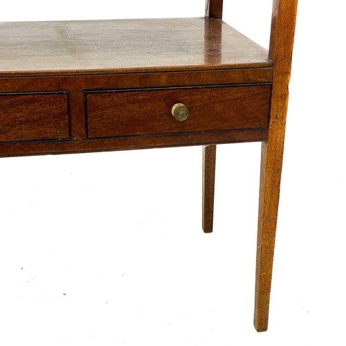 677 - A 19th century mahogany two tier side table. With two short drawers on square tapering supports, hei... 