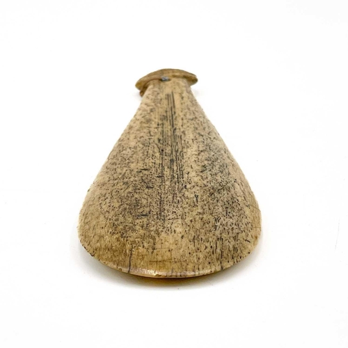 68 - An early 19th century Maori Patu Paraoa. The whalebone of spatulate form a carved hole above a ribbe... 