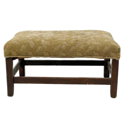 683 - A Georgian mahogany upholstered long stool. Height 35cm width 69cm depth 43.5cm.