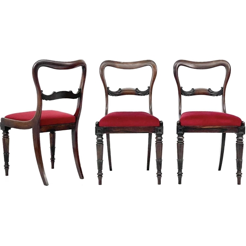 688 - A set of six Victorian rosewood dining chairs. The shaped backs with dished top rails, drop-in uphol... 