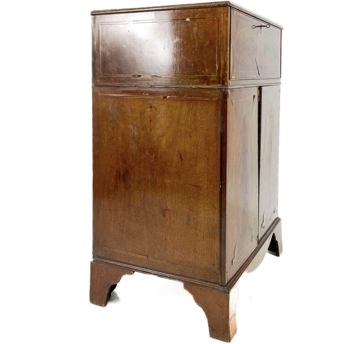 696 - A George III style mahogany secretaire. With oval figured and rosewood banded drop front, enclosing ... 