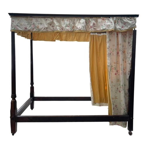 700 - A George III style mahogany four poster bed. Incorporating a pair of turned and fluted pillars with ... 