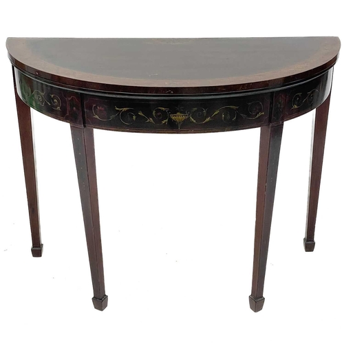 708 - A George III mahogany and inlaid half round fold top card table. In the Adams taste, with neo-classi... 