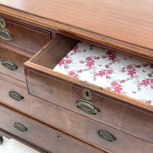 710 - A George III mahogany chest. Of two short and three long drawers, with boxwood and ebony stringing, ... 