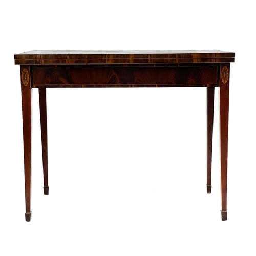 716 - A 19th century mahogany card table. The crossbanded fold over top opens to a green baize surface the... 