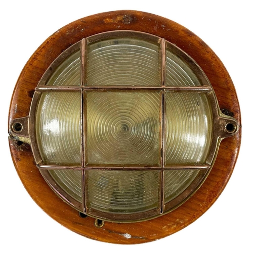 72 - A collection of eight bulkhead lights. Diameter 16cm.