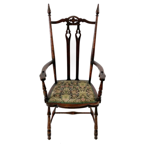 721 - A set of three mahogany Arts and Crafts chairs. Circa 1900, with pierced foliate and reverse spade m... 