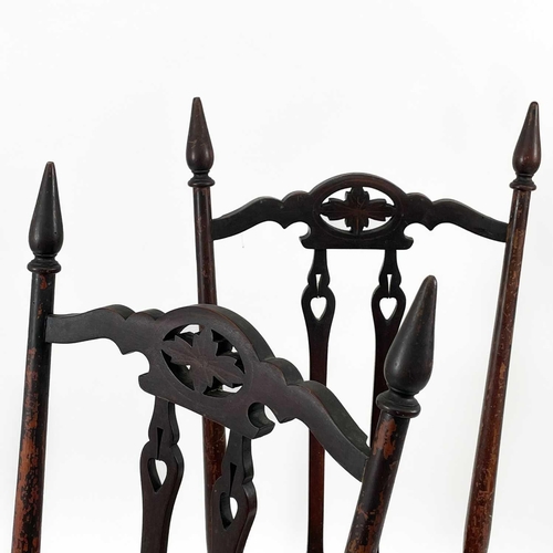 721 - A set of three mahogany Arts and Crafts chairs. Circa 1900, with pierced foliate and reverse spade m... 