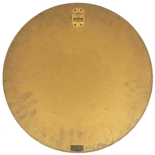 725 - A gilt plaster circular mirror. Mid 20th century, in the Regency taste, labelled for Aisonea, with e... 