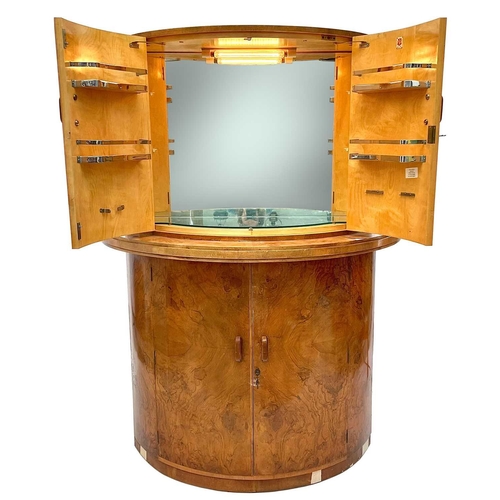 732 - An Art Deco walnut cocktail cabinet by G & F Gold Feather products. Of D shape, fitted two pairs of ... 