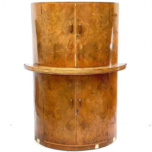 732 - An Art Deco walnut cocktail cabinet by G & F Gold Feather products. Of D shape, fitted two pairs of ... 