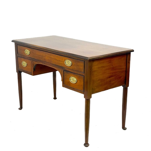 737 - A 19th century mahogany side or dressing table. Fitted one long drawer above two short kneehole draw... 