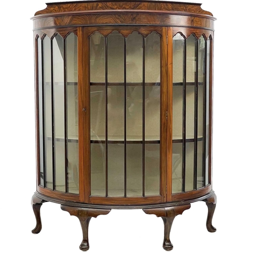 745 - An Art Deco walnut demi lune display cabinet. Height 133cm width 106cm depth 41cm.