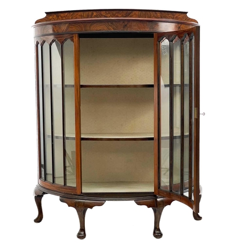 745 - An Art Deco walnut demi lune display cabinet. Height 133cm width 106cm depth 41cm.