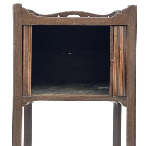 751 - A late George III mahogany tambour front pot cupboard. With fretwork gallery on square chamfered leg... 