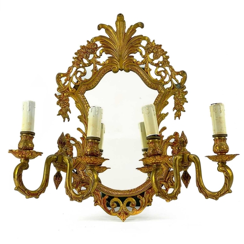 86 - A French brass girandole Decorated with foliate scrolls and flowers, two twin branch lamps, height 4... 