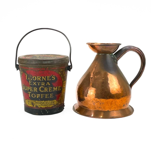 87 - A Thorne's toffee tin and cover and a copper gallon measure. The tin of bucket form promoting 'Extra... 