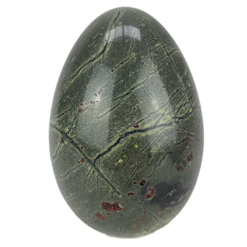 98 - A group of seven turned Cornish serpentine eggs and hand coolers. In various sizes, and mixed colour... 