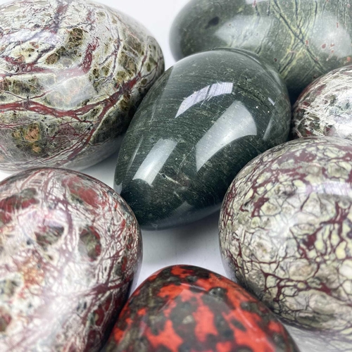 98 - A group of seven turned Cornish serpentine eggs and hand coolers. In various sizes, and mixed colour... 