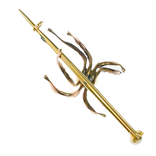 186 - A Victorian gold diamond and pearl set spider bar brooch. The applied spider with pearl body and sev... 