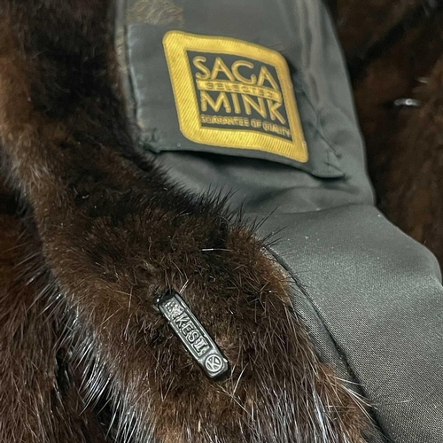 A Saga mink fur coat. A vintage full-length mink coat with collar