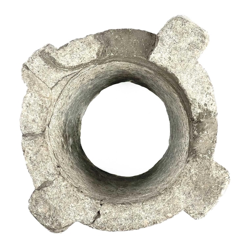 27 - A stone mortar. Possibly mediaeval, damaged, height 12cm