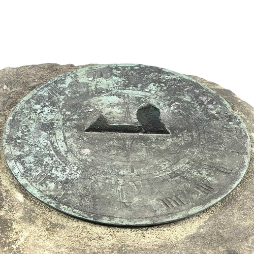 284 - A bronze sundial on a sandstone plinth. The 20.2cm diameter dial signed J Hawley and dated 1794, hei... 