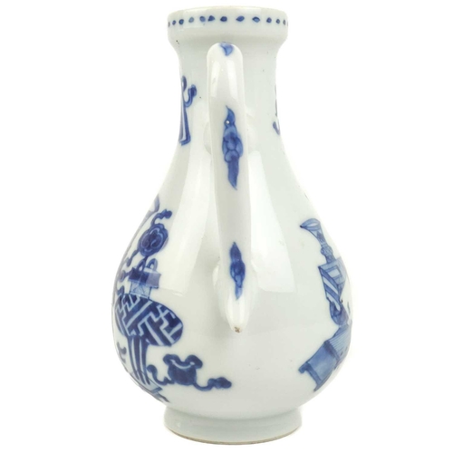 1002 - A Chinese blue and white water jug, Kangxi (1662-1722). Decorated with precious objects and a panel ... 