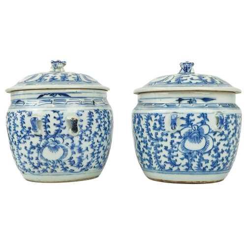 1011 - Two similar Chinese blue and white porcelain pots and covers. Mid 20th century, decorated with flowe... 