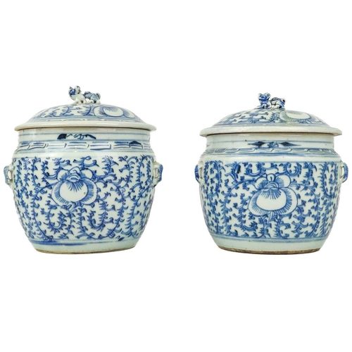 1011 - Two similar Chinese blue and white porcelain pots and covers. Mid 20th century, decorated with flowe... 