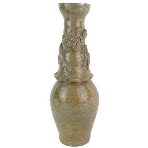 1028 - A Chinese celadon stoneware vase, Song style. The dragon in high relief above a ribbed body, height ... 