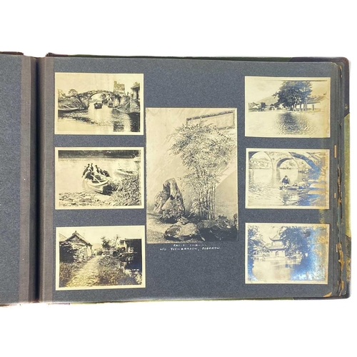 1091 - A Chinese photo album, early 20th century. Including views in Shanghai dated 1910 and 1911, Soochow,... 